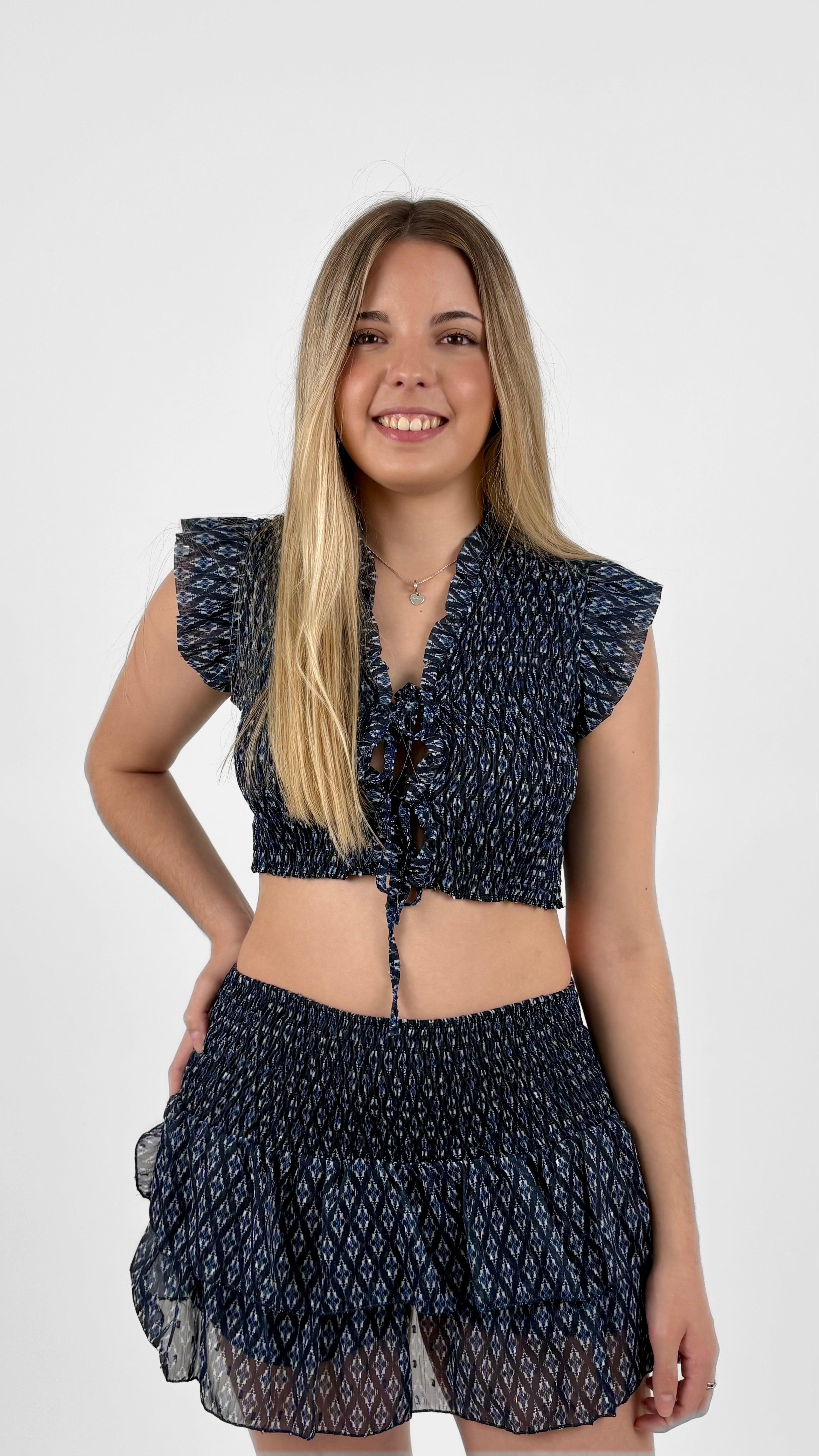Minifalda pantalón volantes estampado azul marino