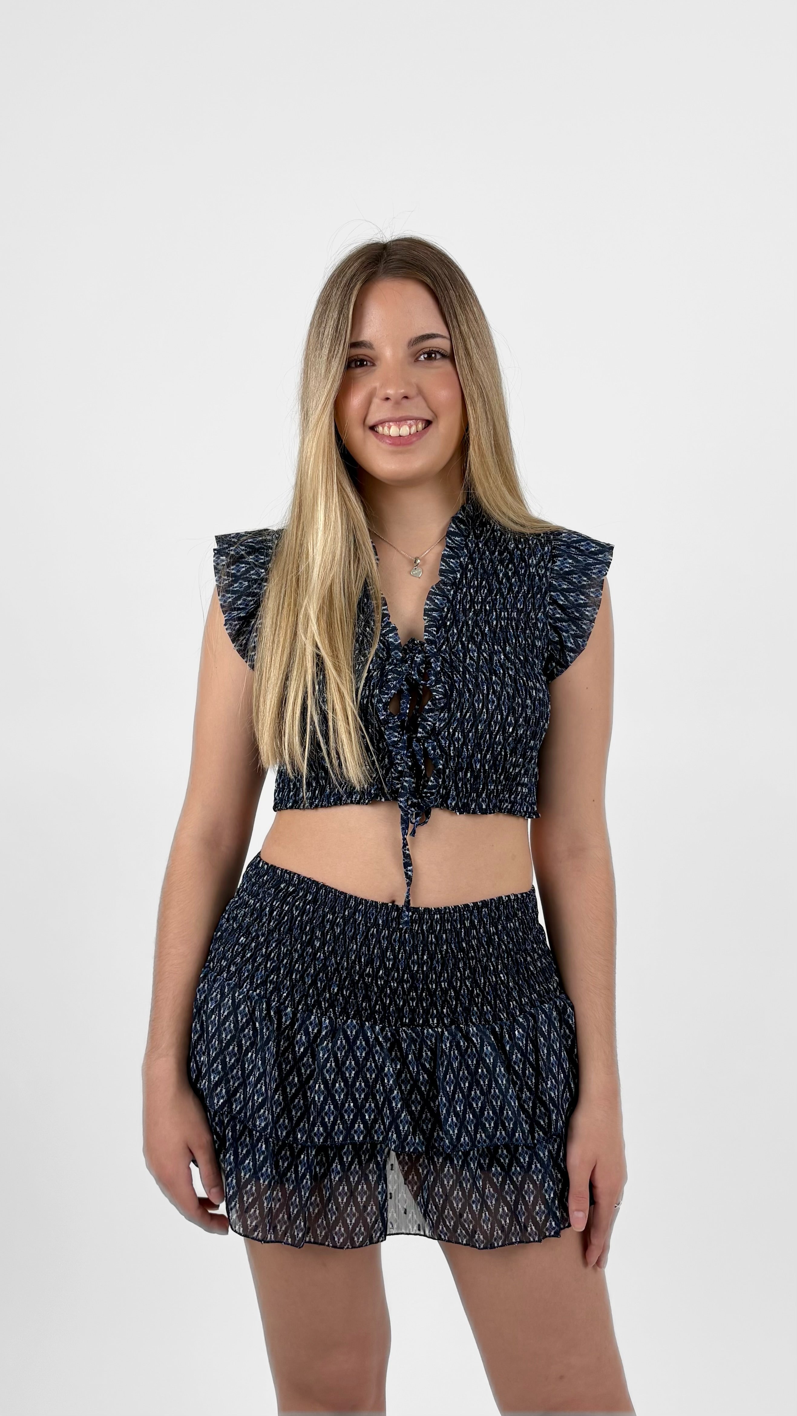 Minifalda pantalón volantes estampado azul marino