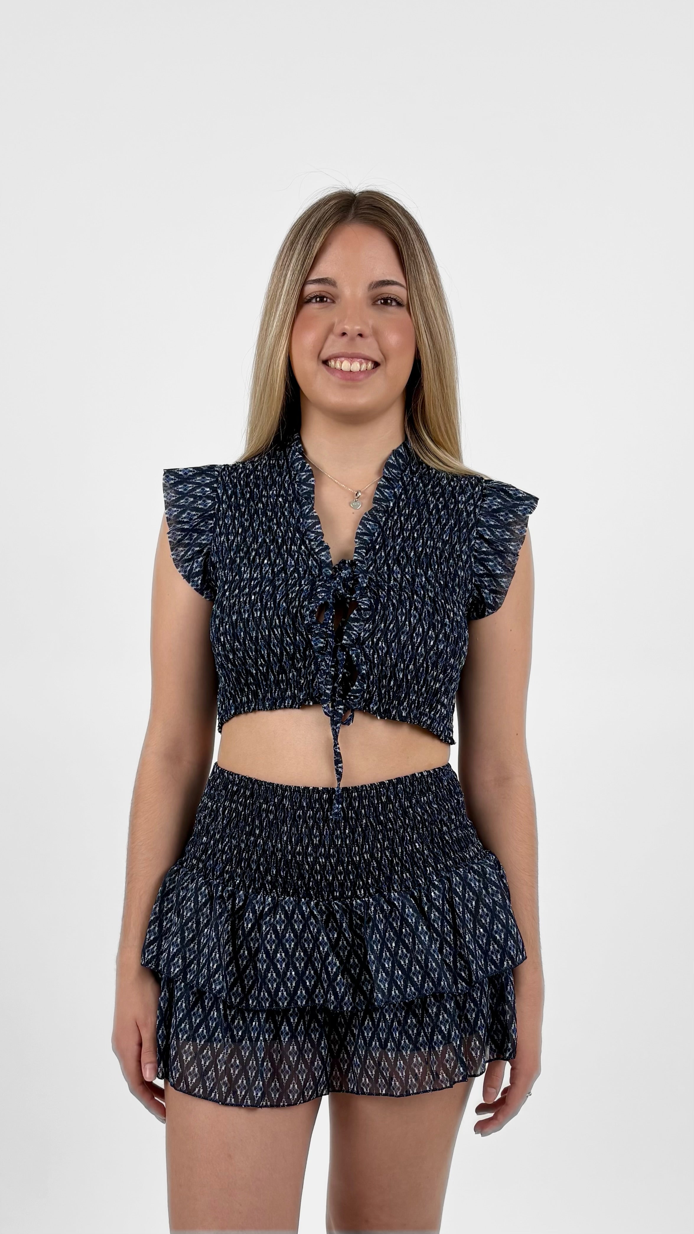 Minifalda pantalón volantes estampado azul marino